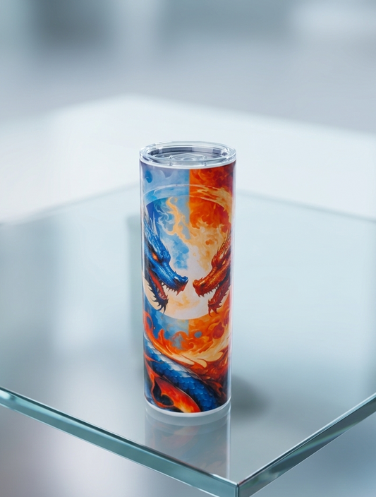 Tall tumbler on a glass table, showing a blue dragon and an orange dragon facing each other on a split-colour background.
