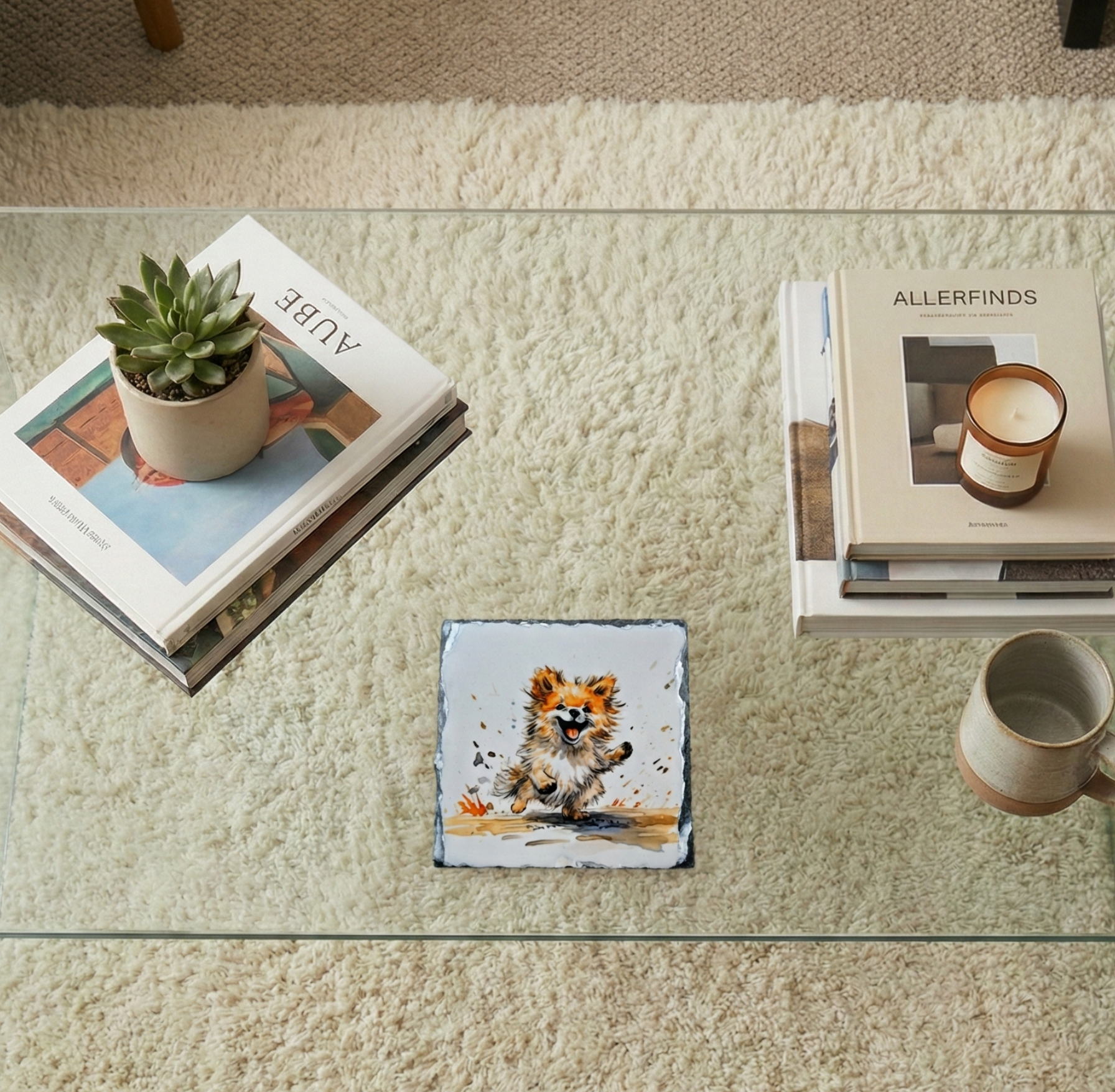 Slate coaster showing a fluffy ginger dog running, on a glass coffee table in a light-filled room.