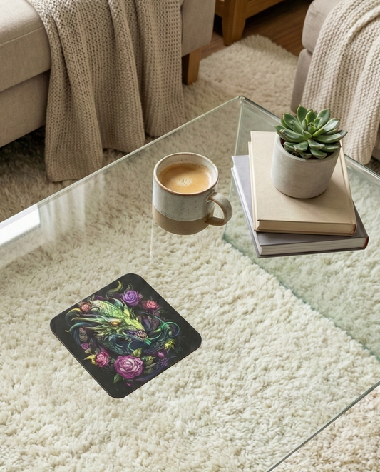 Single square black coaster featuring a lime-green dragon and violet roses sits on a clear glass table over a cream shagpile rug.