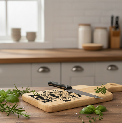 Small rectangular light wood chopping board lying flat on a wooden surface. A silver kitchen knife rests across the board.
